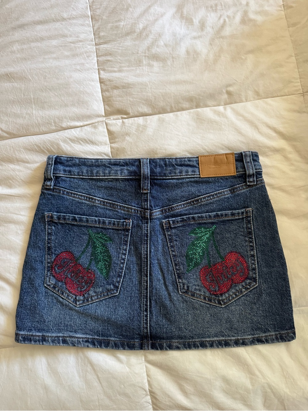 Juicy Couture Denim Mini Skirt with Bedazzled Cherry